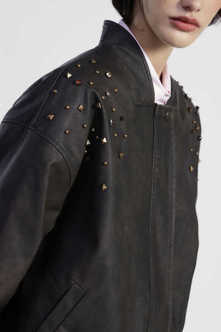 Bomber jacket with embellishments and front closure