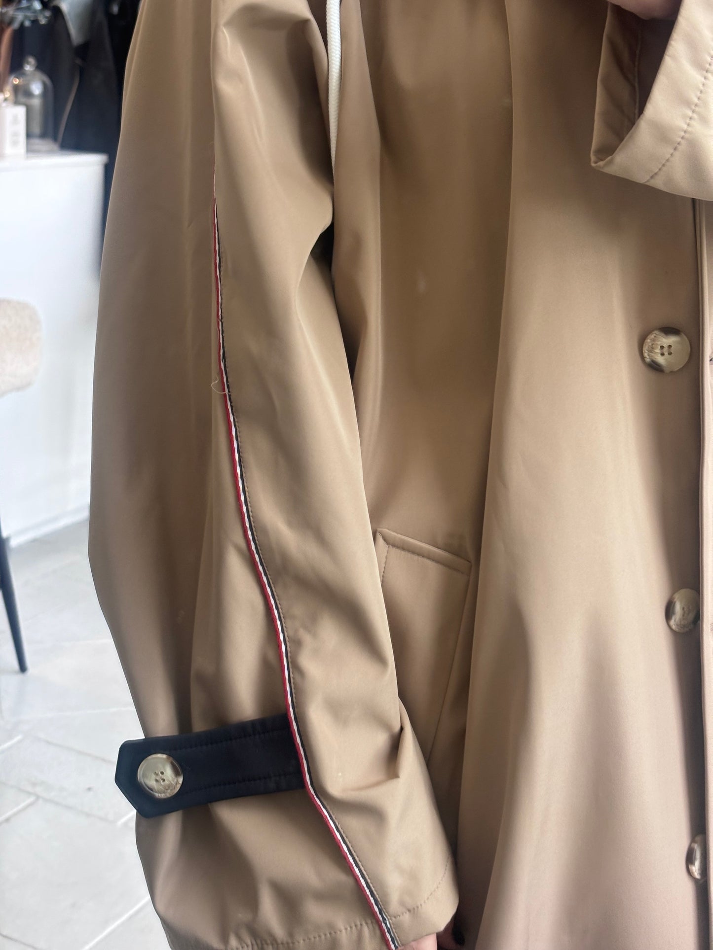 Long beige trench coat with hood