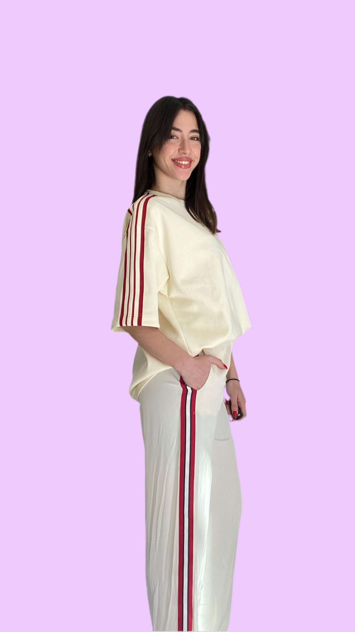 Cream pants with stripes on the side