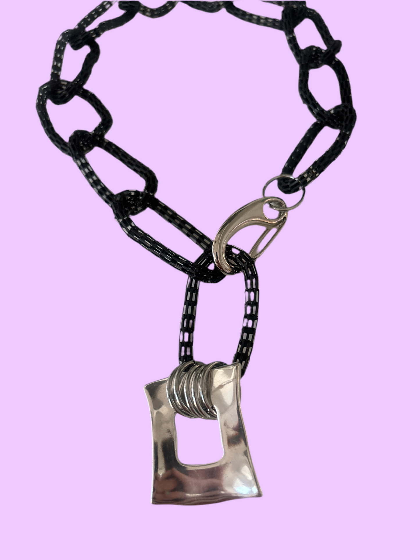 Black matt necklace with silver square pendant