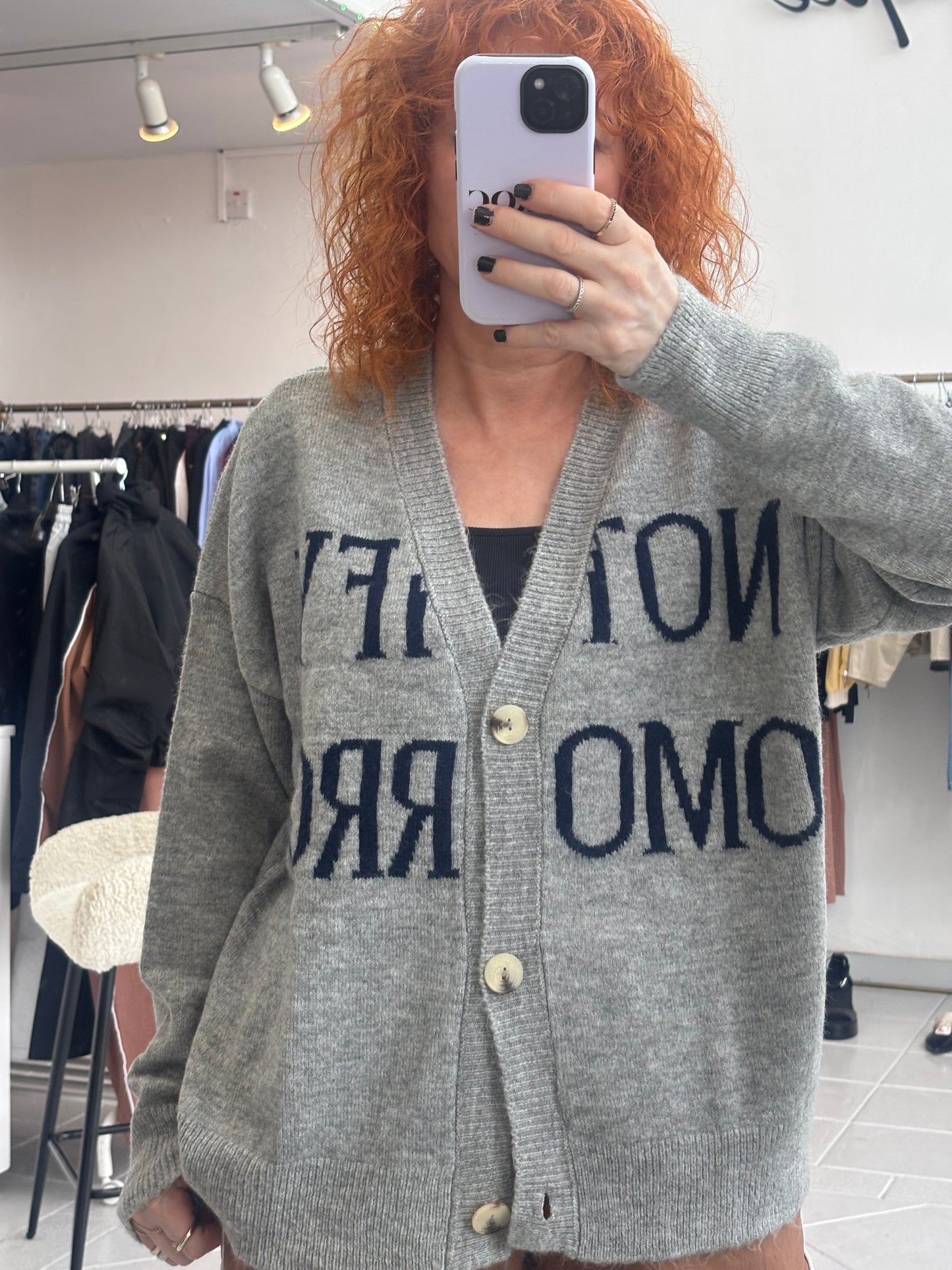 Grey cardigan with blue letters