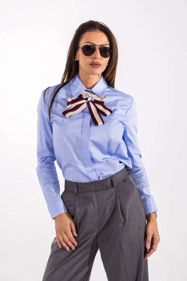 Blue shirt with jeweled bow