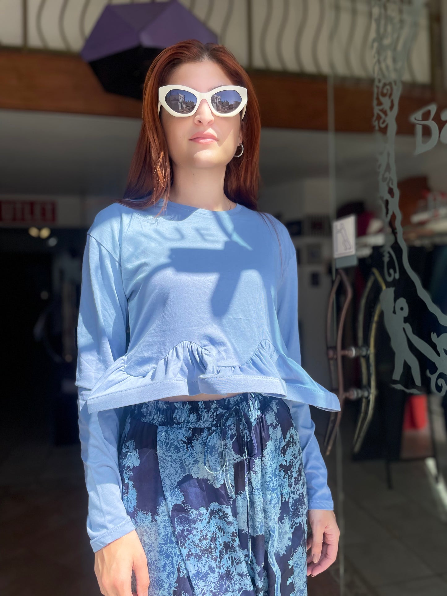 Long sleeve top with wavy hem