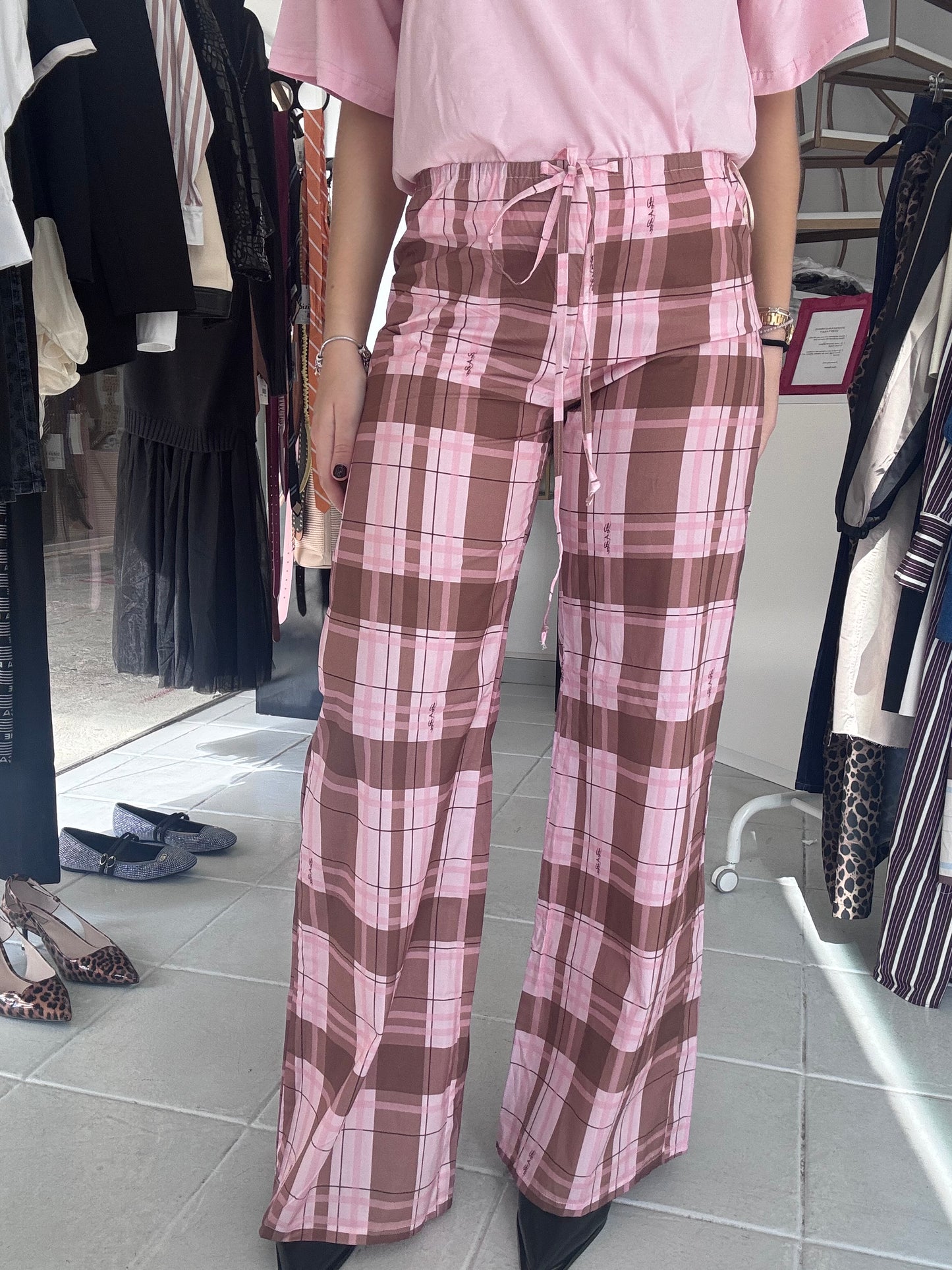Pink plaid pants with signature print