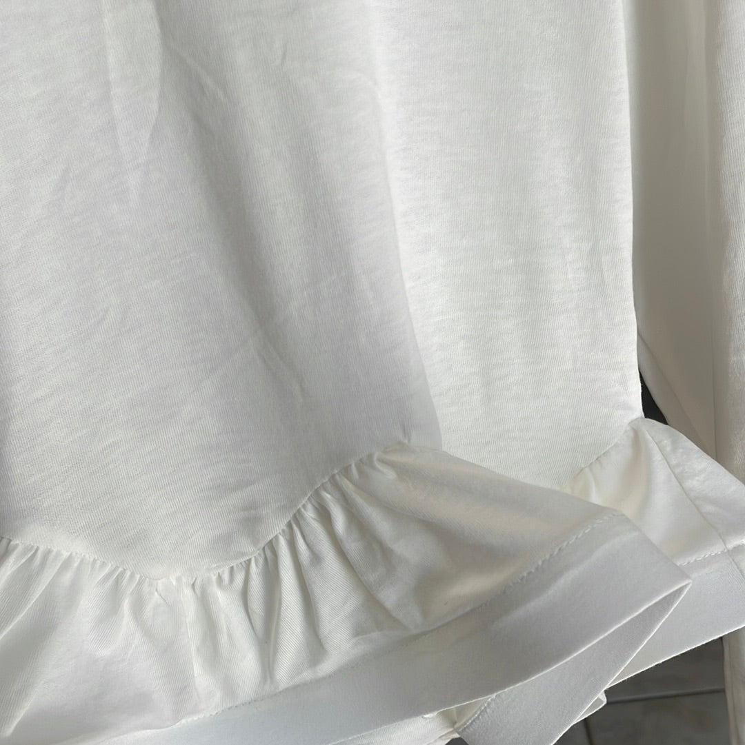 Long sleeve top with wavy hem