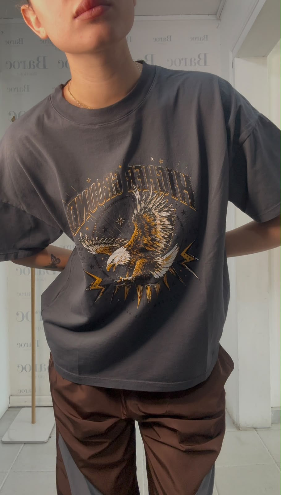 Gray oversized t-shirt with front print. Baroc Boutique