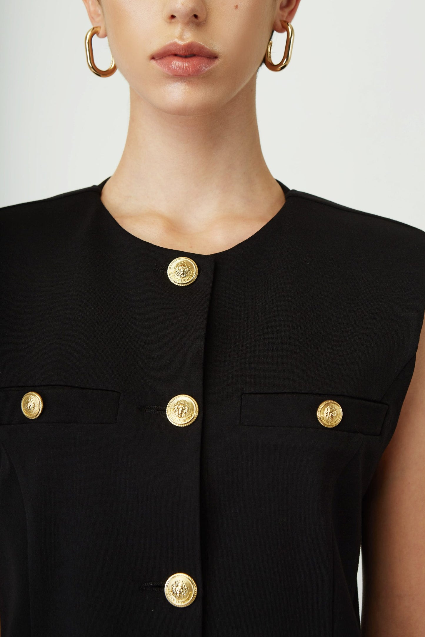 Sleeveless vest with gold buttons Baroc Boutique