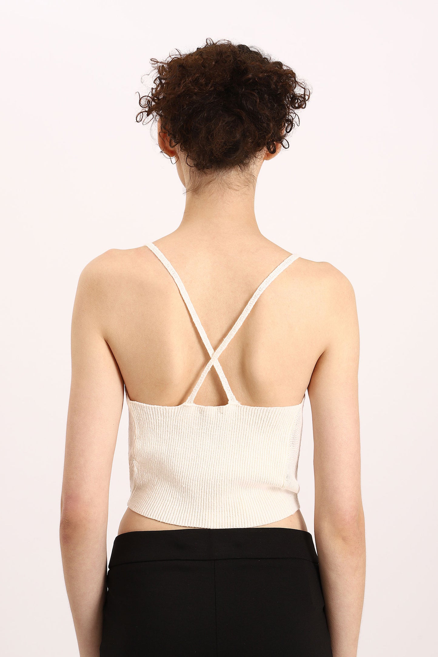 Solid-colour crop top with spaghetti straps