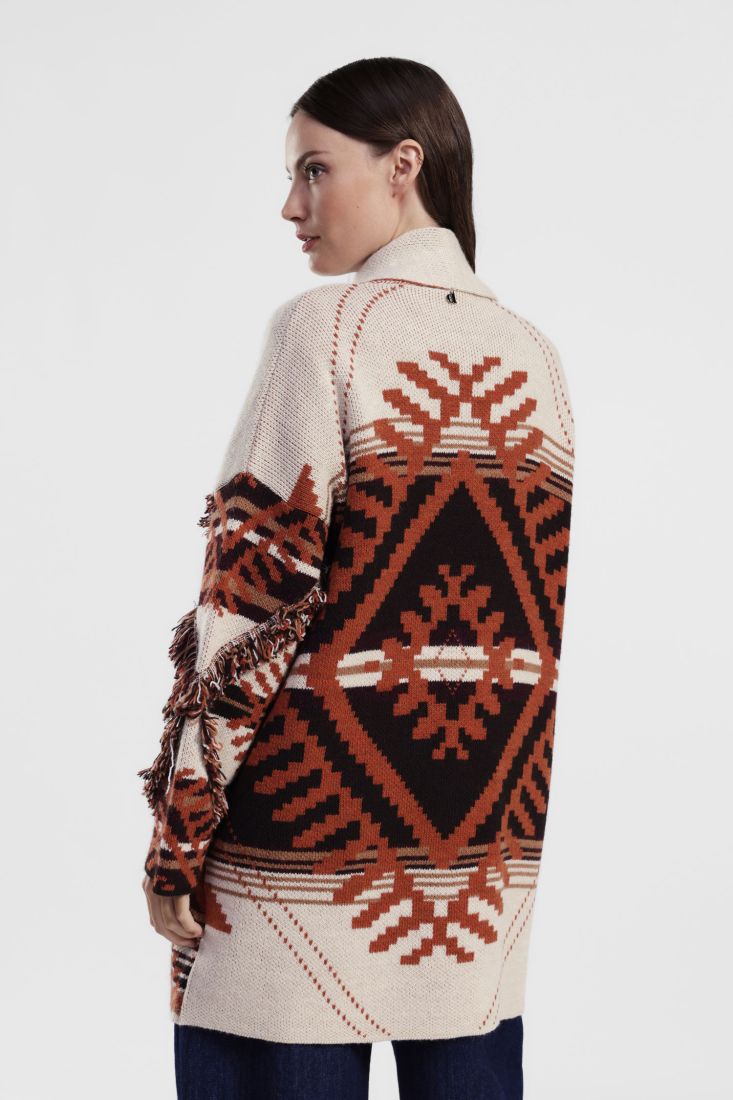 Geometric patterned coat with fringes and buttons