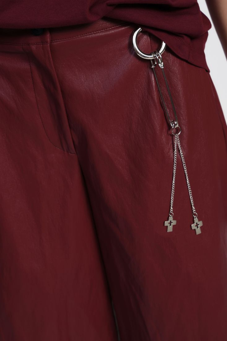 Knee-length faux leather shorts