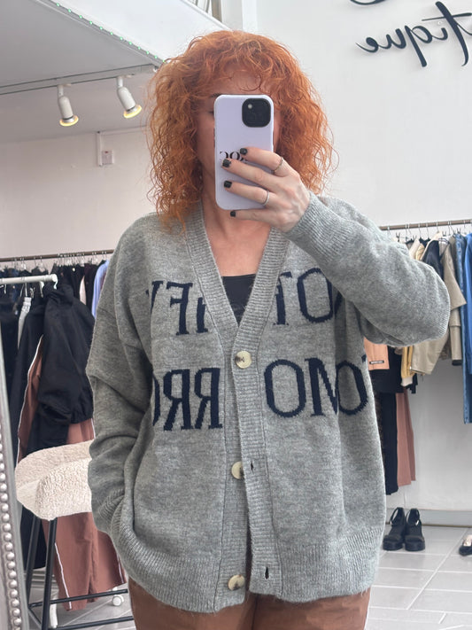 Grey cardigan with blue letters