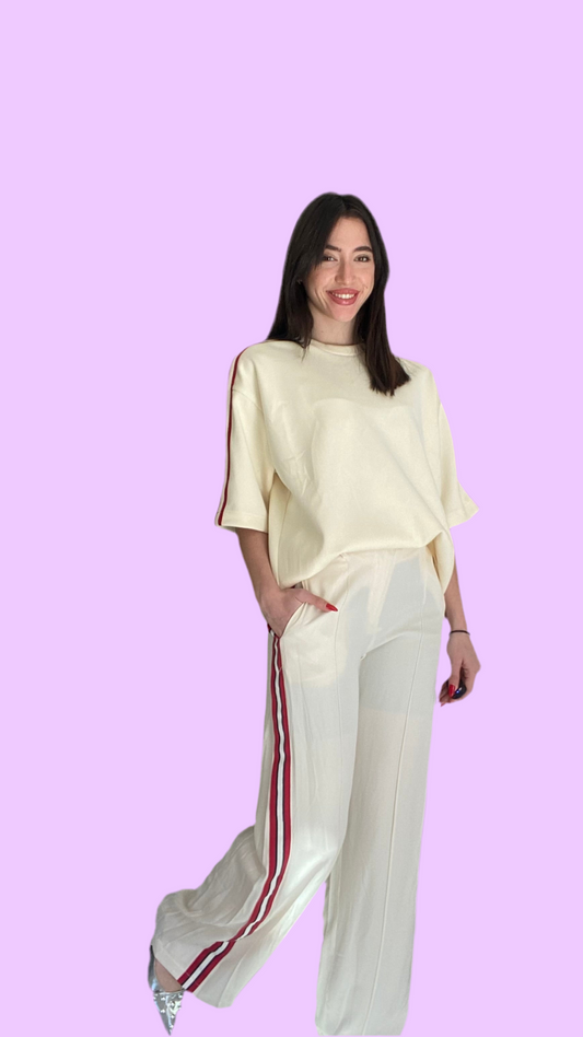 Cream pants with stripes on the side