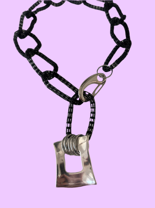 Black matt necklace with silver square pendant