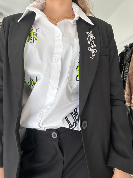 Black blazer with embroidery and and jewel pins