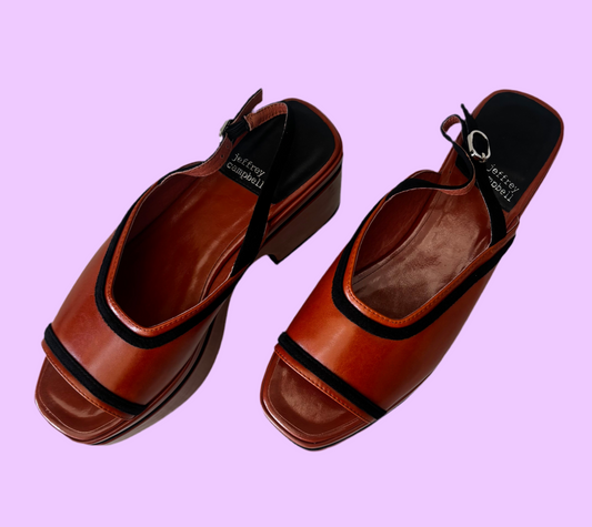 Brown sandals with black details
