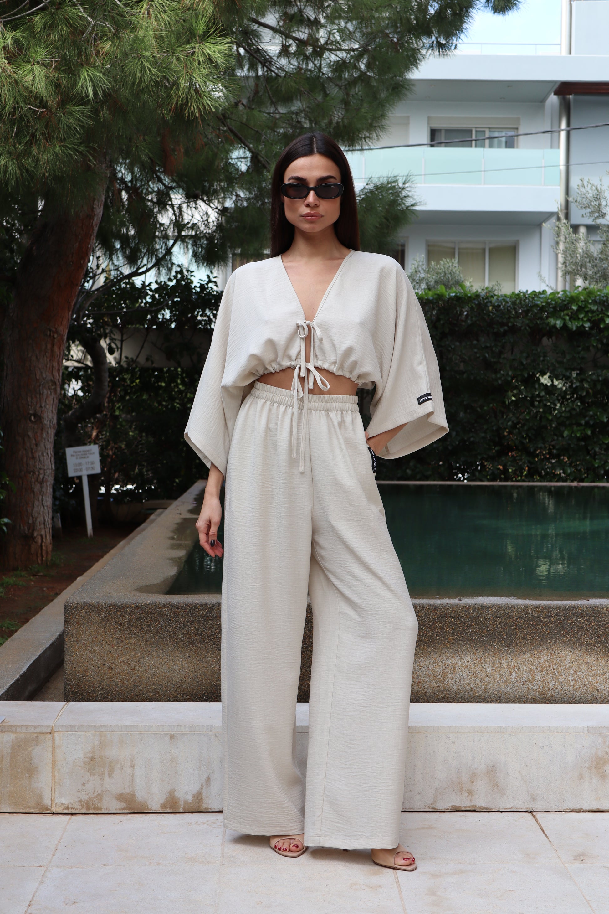 Long wide leg pants with band on the waist Baroc Boutique