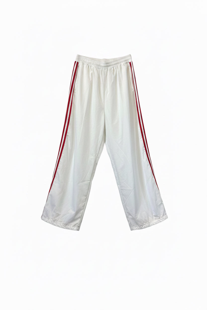 Parachute pants with stripes on the side Baroc Boutique