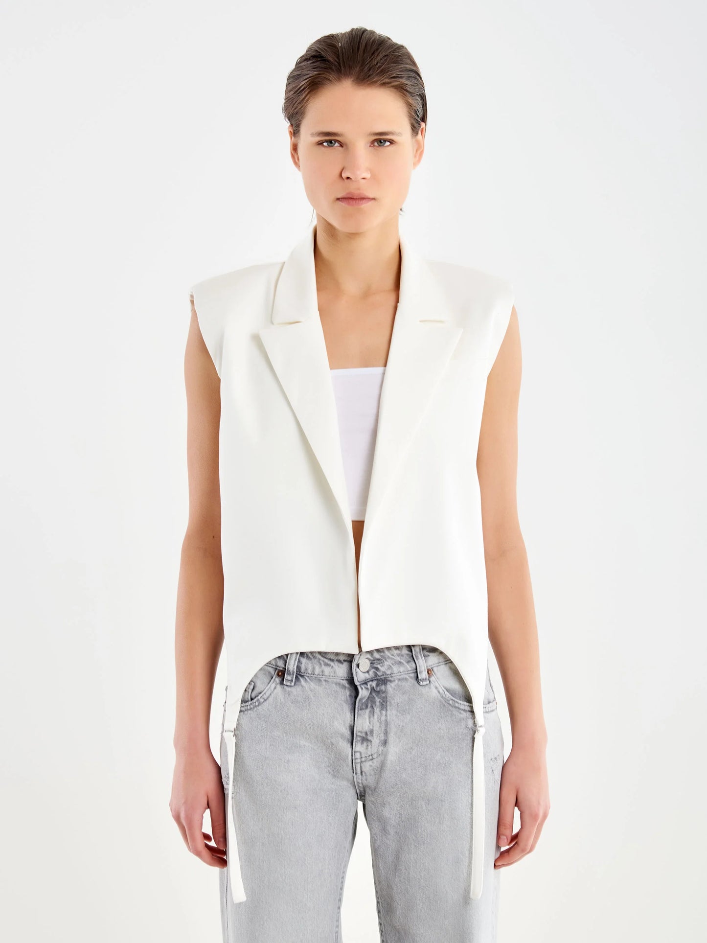 Sleeveless vest with hanging strings Baroc Boutique