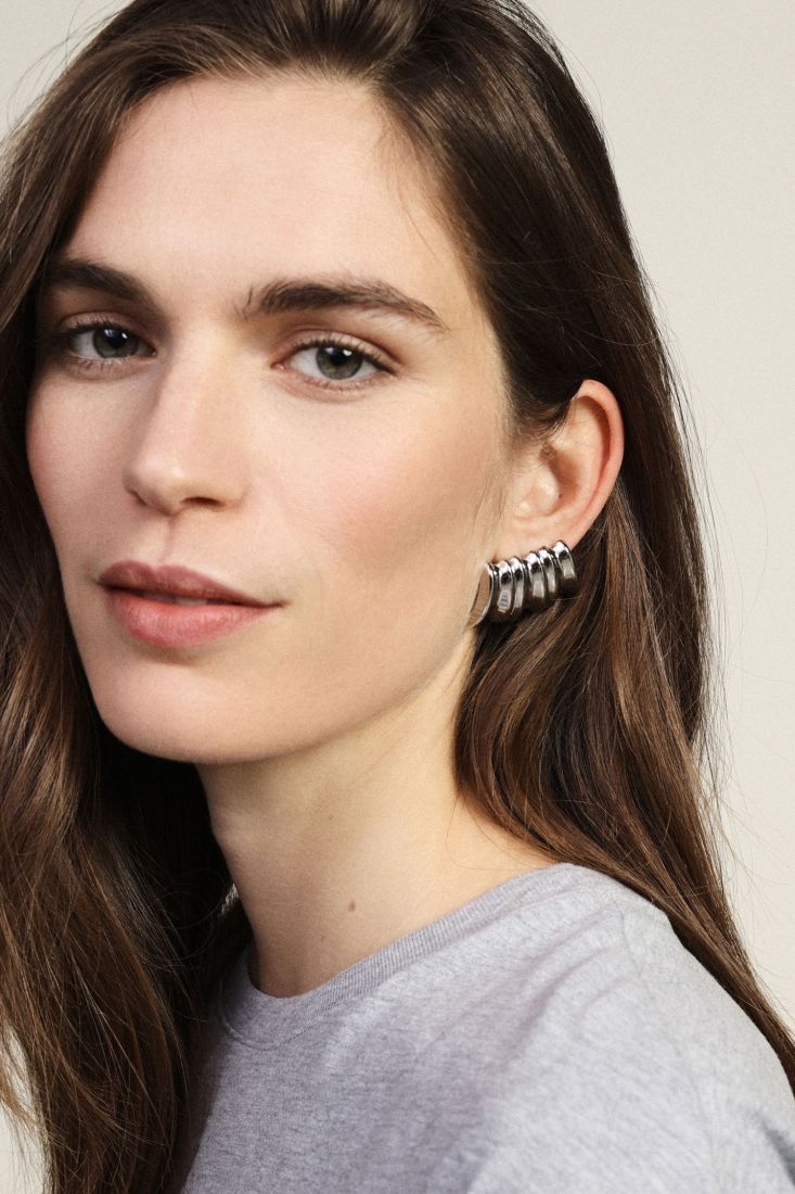Stud earrings with sculpted wave design Baroc Boutique