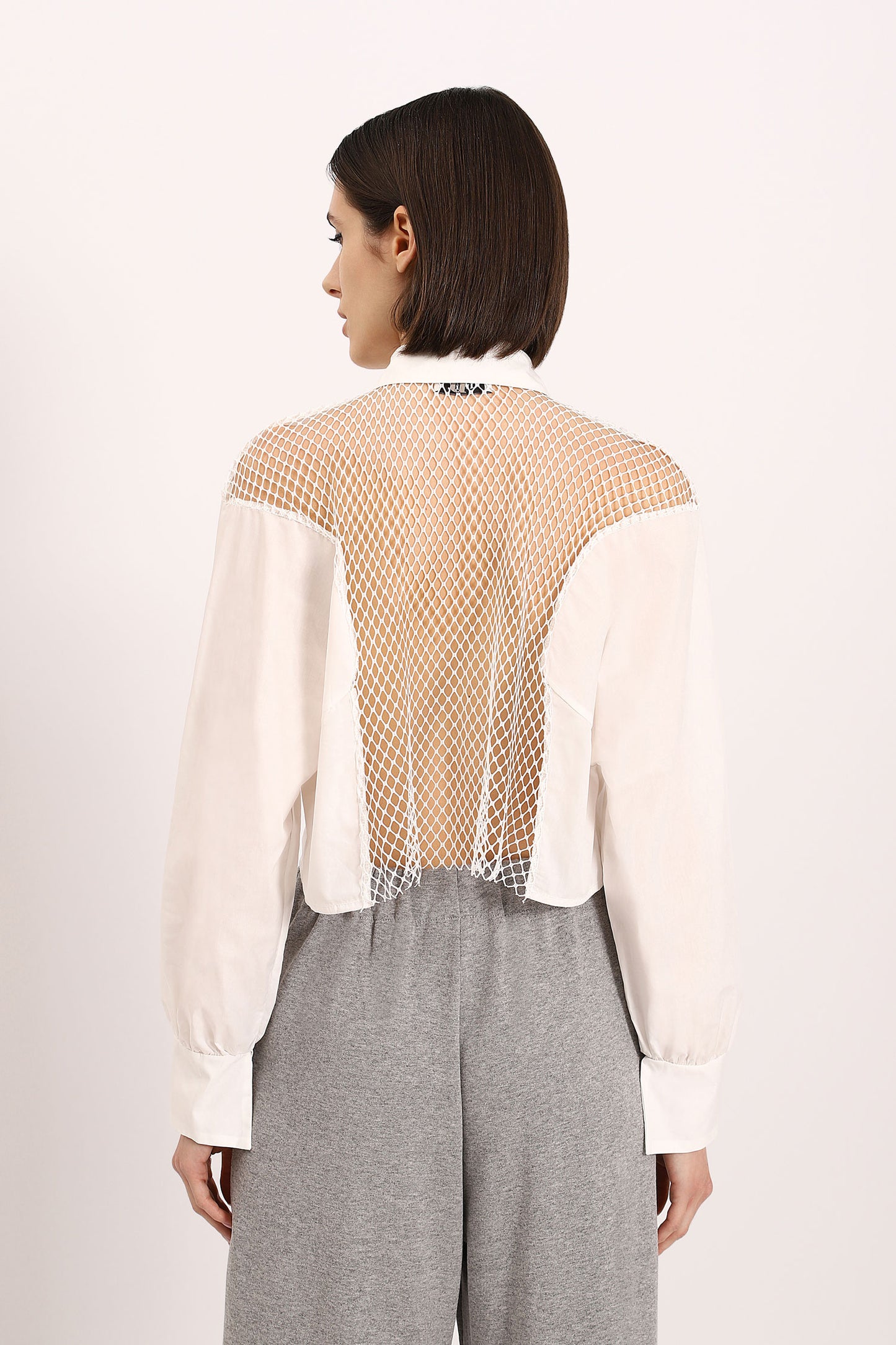 Solid-colour cropped shirt with openwork insert